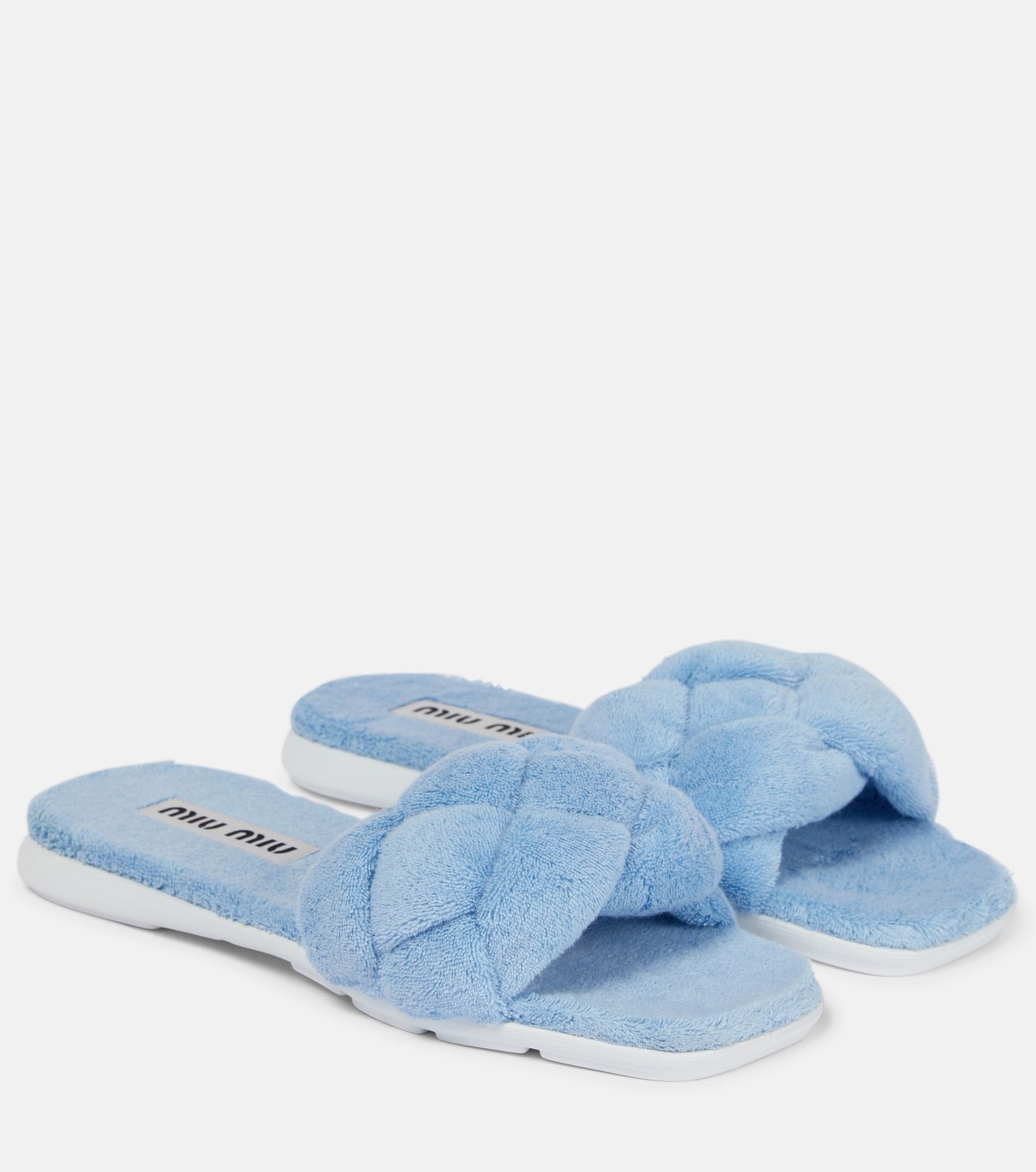 Blaue Mules von Miu Miu