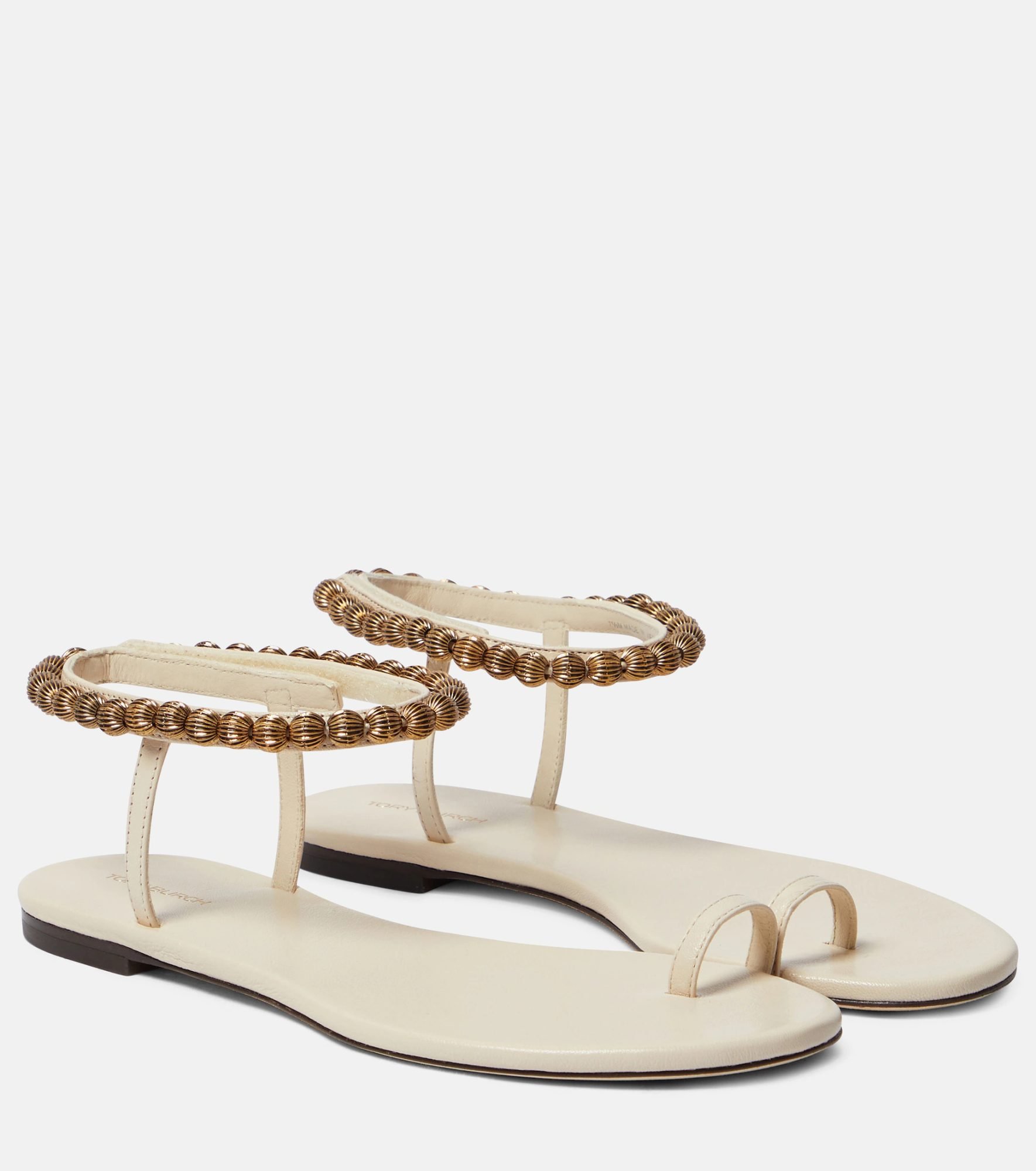 Weiße und goldene Sandalen von Tory Burch